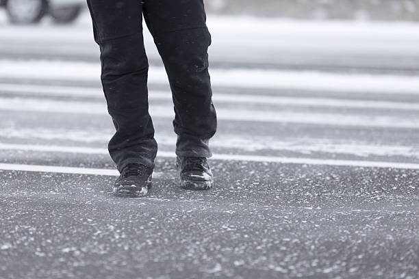 istock Man walking in snow 636462758