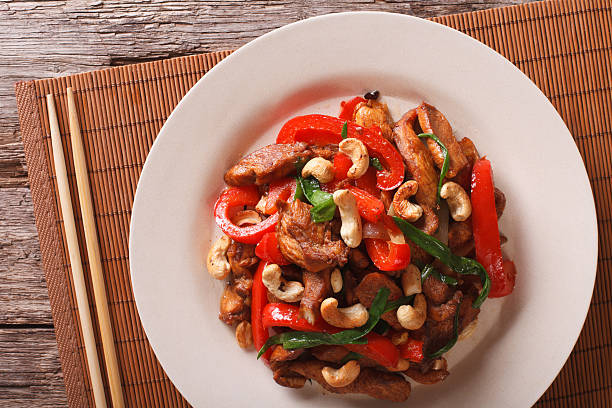 istock Thai chicken with vegetables and cashew close-up. horizontal 636464442