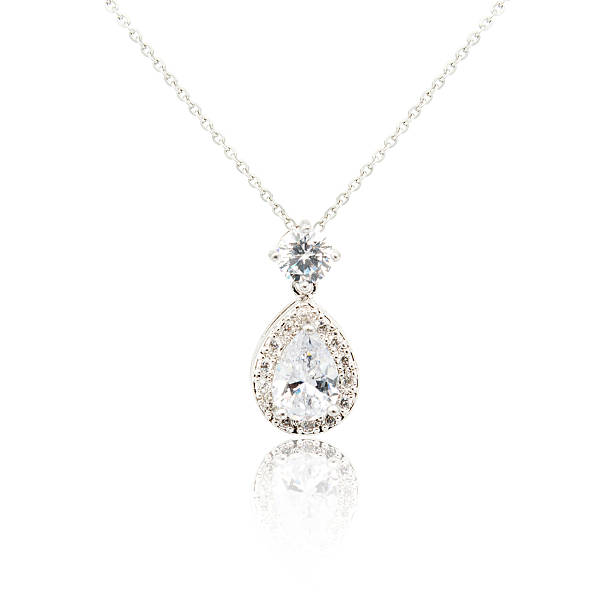 istock Silver fashion pendant isolated on white 636466816