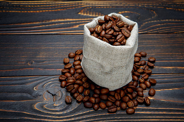istock roasted coffee beans on wooden background 636467166