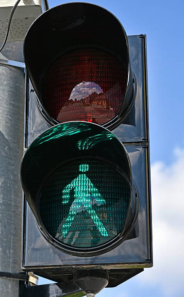 istock Green traffic light at the road cossing 636471390