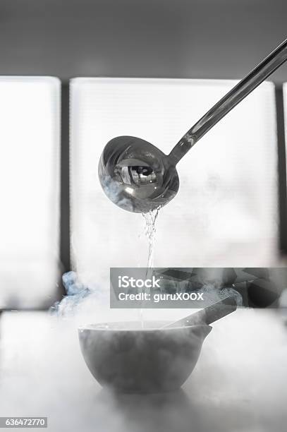 Laboratory Experiment With Liquid Nitrogen In Laboratory Mortar Stock Photo - Download Image Now