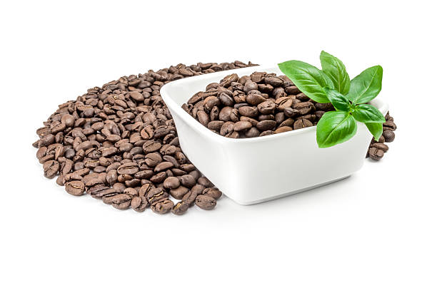 istock Closeup of coffee beans isolated on a white background cutout 636475912