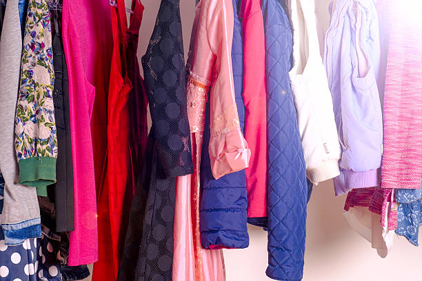 istock Set of clothes for kids on hangers. Shopping. 636477832