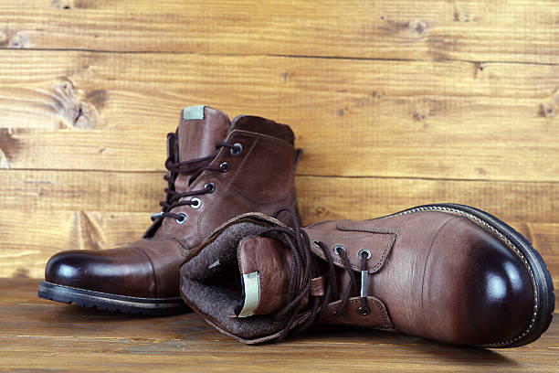 istock Brown leather winter mens high boots, shoes 636483302