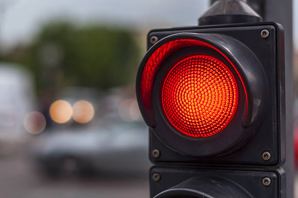 istock Red traffic light in the city street 636484146