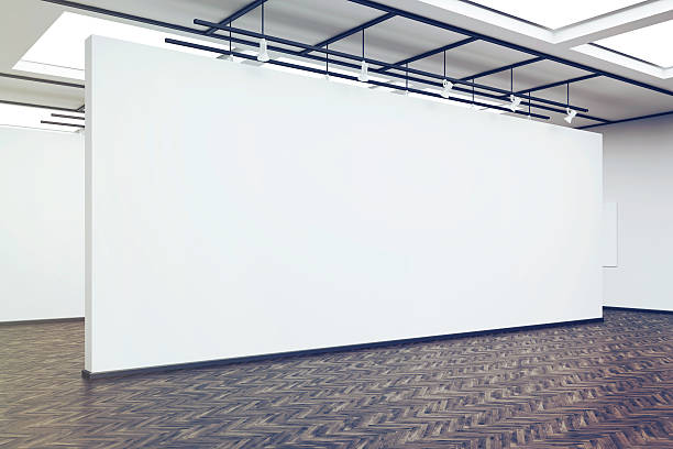 istock large blank wall in an art gallery with dark wood 636488688