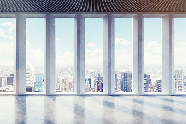 istock Empty room with windows with wide vertical shades, toned 636489414