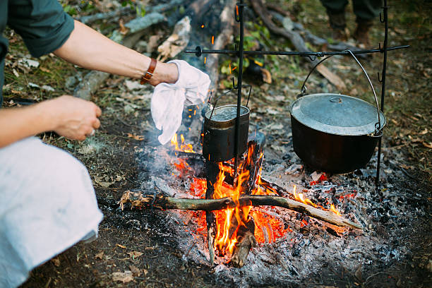 istock Food Is Cooked Over A Fire  An Old Marching Pot 636493462
