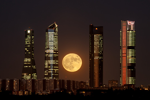 Super moon at Four Towers Skyline. Madrid, Spain