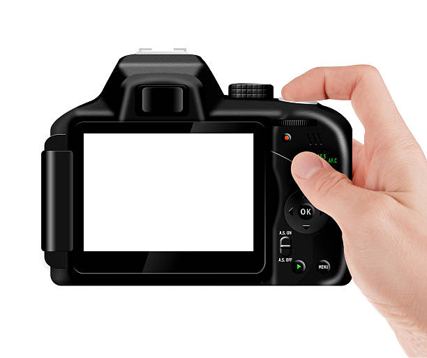 istock Hand holding professional, digital SLR camera 636495526