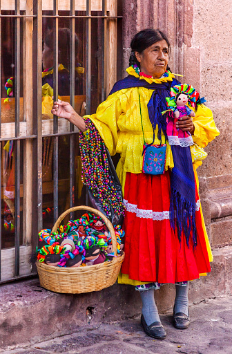 San Miguel de Allende, Mexico - December 27, 2014: Indian Woman Peddler Souvenires Lupita Dolls Jardin Town Square San Miguel de Allende Mexico.