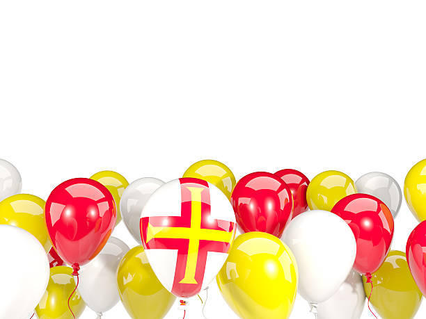 istock Flag of guernsey with balloons 636505354