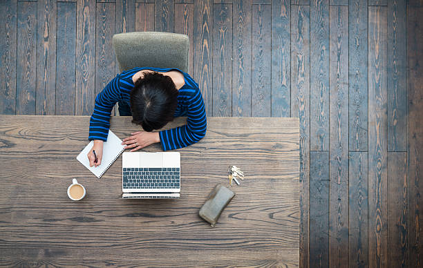 istock Woman working at home with a laptop 636508684