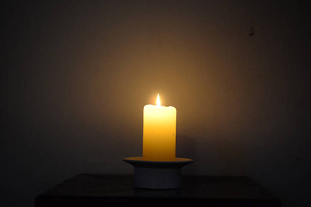 istock Candlelight reveals the dark 636510696