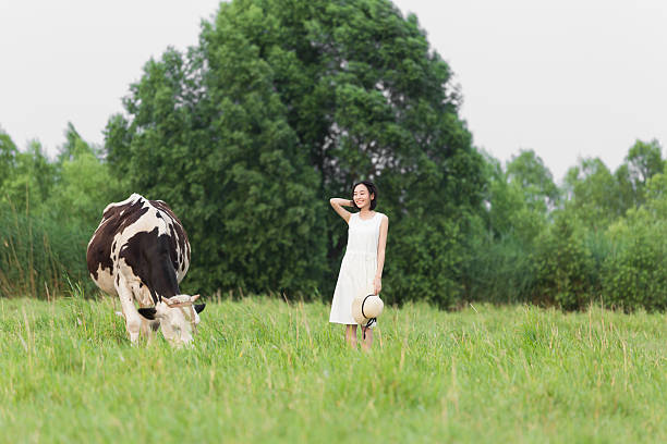istock pretty girl in a green pasture 636511644