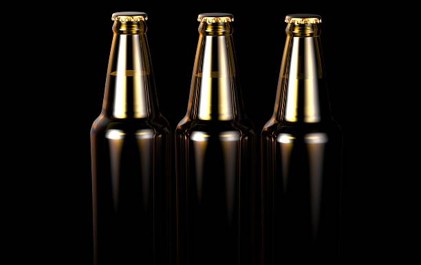 istock Close up bottles of beer on a black background. 636519418