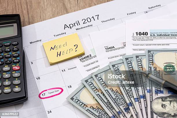 Text Need Help With Tax Form Money And Calendar Stock Photo - Download Image Now