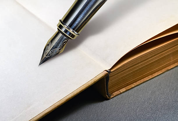 istock Book and fountain pen 636521050