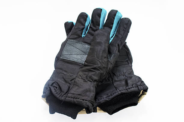 istock Isolated pair of blue black Gloves 636521488
