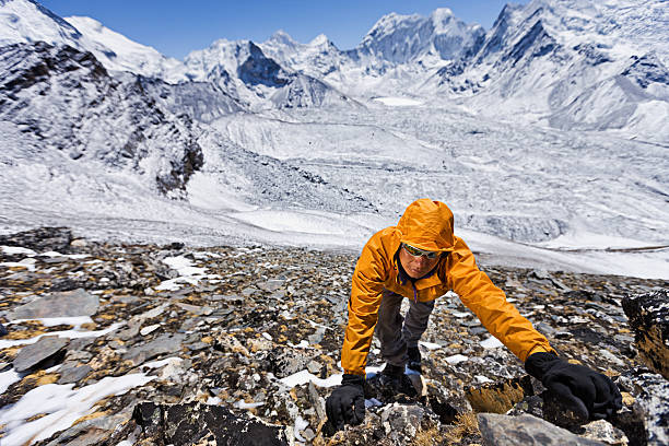 istock Nepali sherpa climbing in Himalayas 636522692