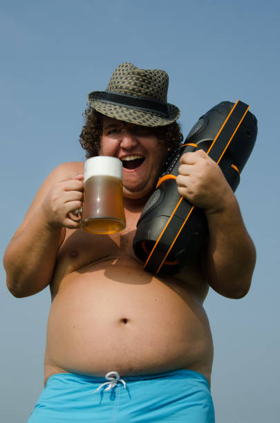 istock Party. Drunk man with a boombox and beer. 636522694