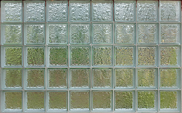 istock Glass Brick Wall, Decorated architectural glass useful as a background 636525560