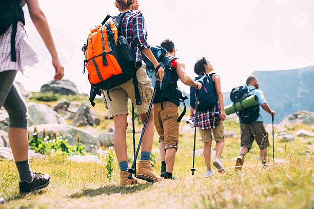 istock Friends hiking in the mountain 636526246