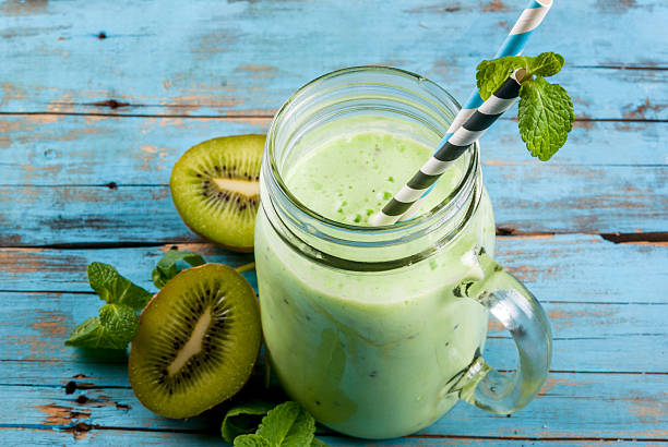 istock Refreshing green smoothie or milkshake in mason jar 636527694