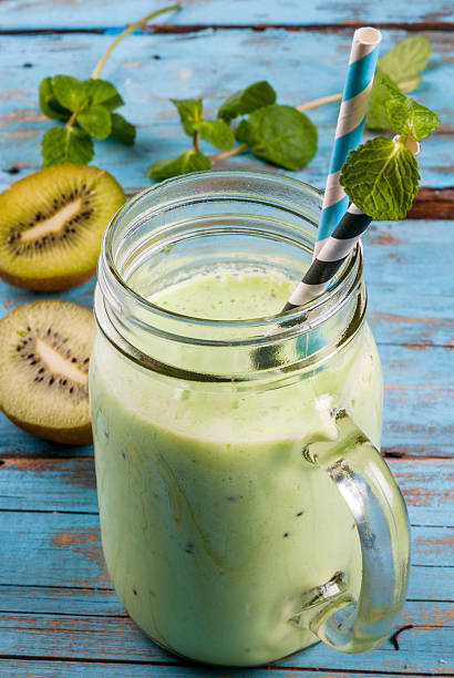 istock Refreshing green smoothie or milkshake in mason jar 636527718
