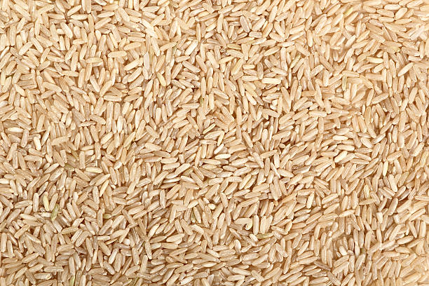 istock Background of long grain brown rice 636528088