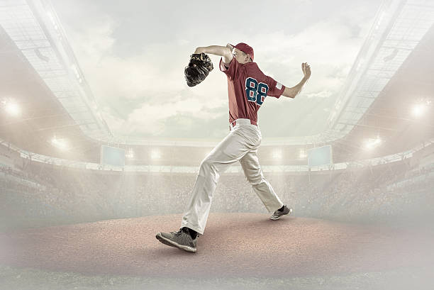 istock Baseball players in action on the stadium. 636532362