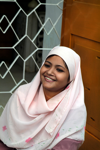 Dhaka, Bangladesh - September 17, 2007: Unidentified friendly smiling woman with traditional headscarf