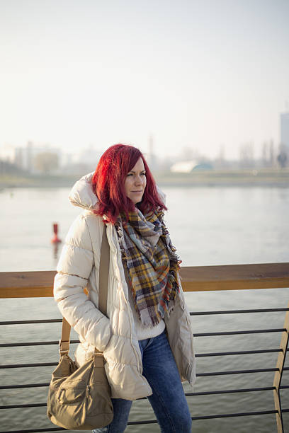 istock Woman standing on her balcony and enjoying 636533436