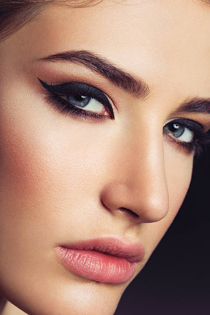 istock Beautiful girl with cat eye make-up 636534216
