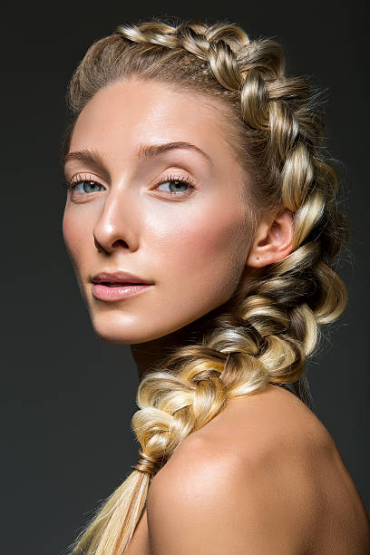 istock Beautiful girl with braid and natural make-up 636534454