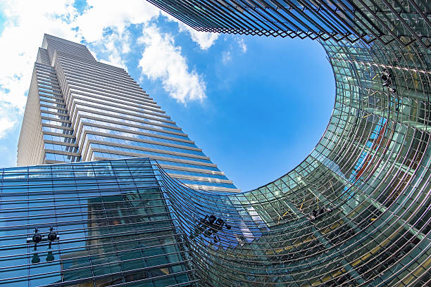 istock NYC infinite corporate office buildings and blue sky 636535008