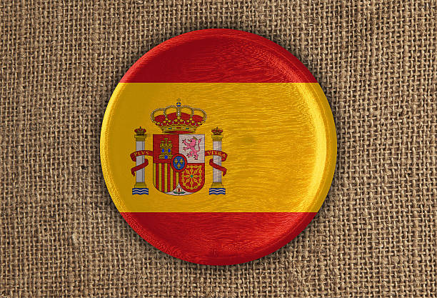 istock Spain Textured Round Flag wood on rough cloth 636536034