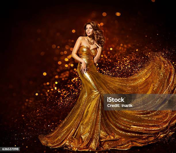 Fashion Woman Gold Dress Girl Elegant Golden Fabric Gown Stock Photo - Download Image Now