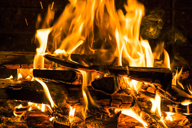 istock Burning firewood in the fireplace close up, BBQ 636542106