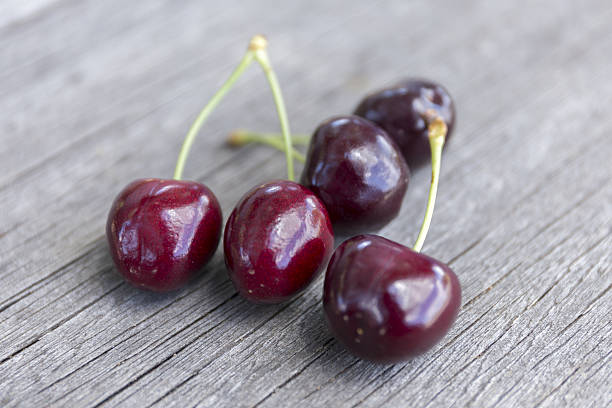 istock Fresh cherry on old wooden 636544306