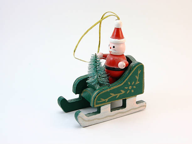 istock Toy sleigh with Santa Claus. 636544928