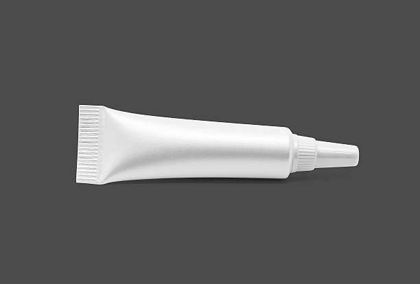 istock blank packaging cosmetic serum tube isolated on gray background 636546856