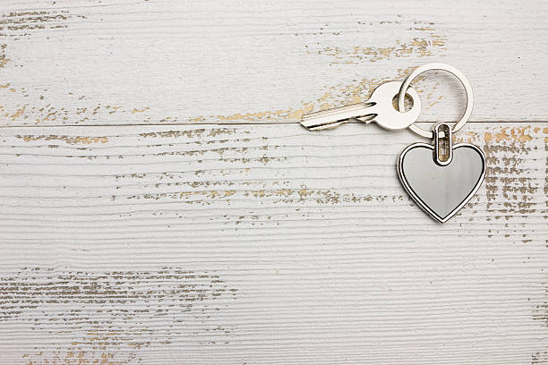 istock Heart-shaped keys in the wood 636554682