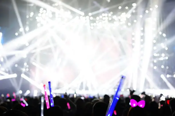 Photo of Defocused entertainment concert lighting on stage