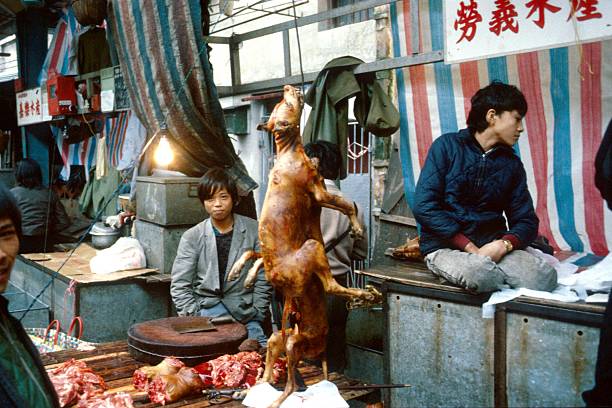 Beijing, China, January 23, 1980. Sales on a Beijing market. The stand offers dog meat for consumption. In some regions in China, dog meat is regarded as a delicacy.