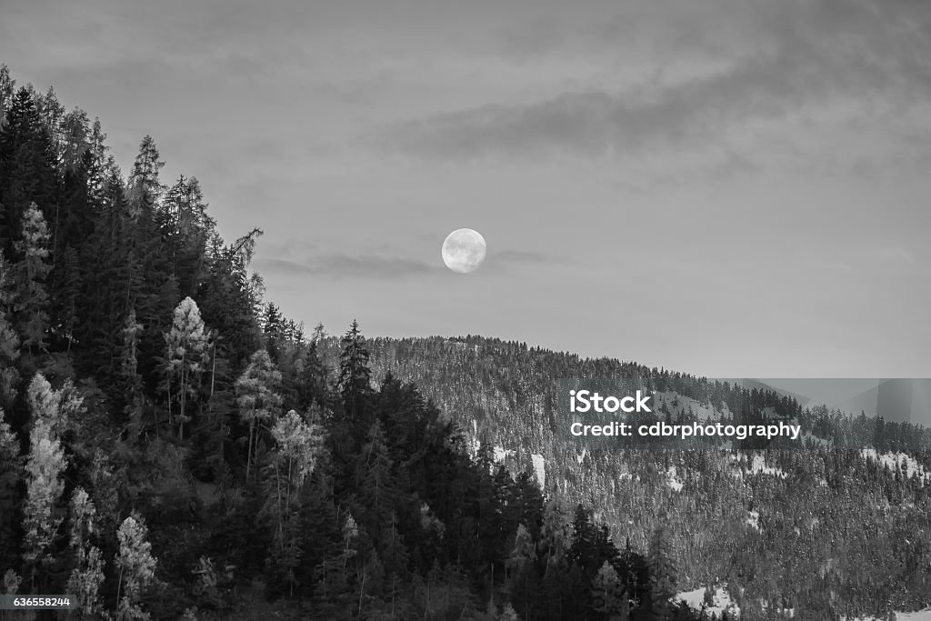 Full moon over the alps The November 2016 'Supermoon' above the snowy peaks of the Swiss alps. Backgrounds Stock Photo
