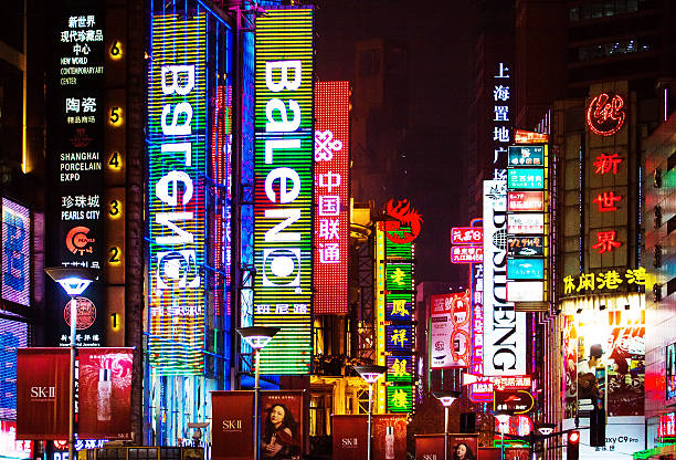 istock Neon signs lit on Shanghai Nanjing Road 636562464