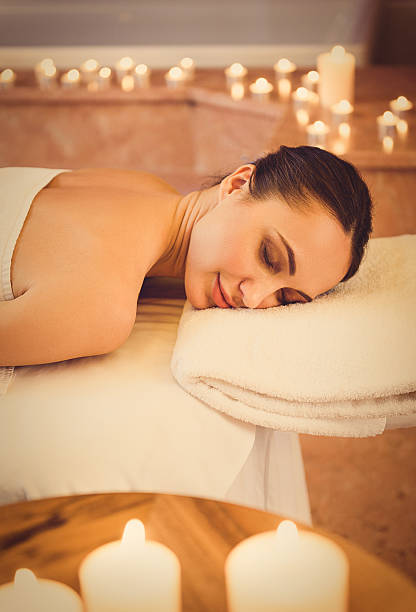 istock Voluptuous girl enjoying spa treatment 636563378
