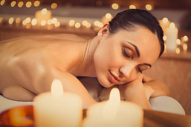istock Relaxed woman resting at spa 636565230
